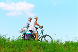 Elderly couple cycling